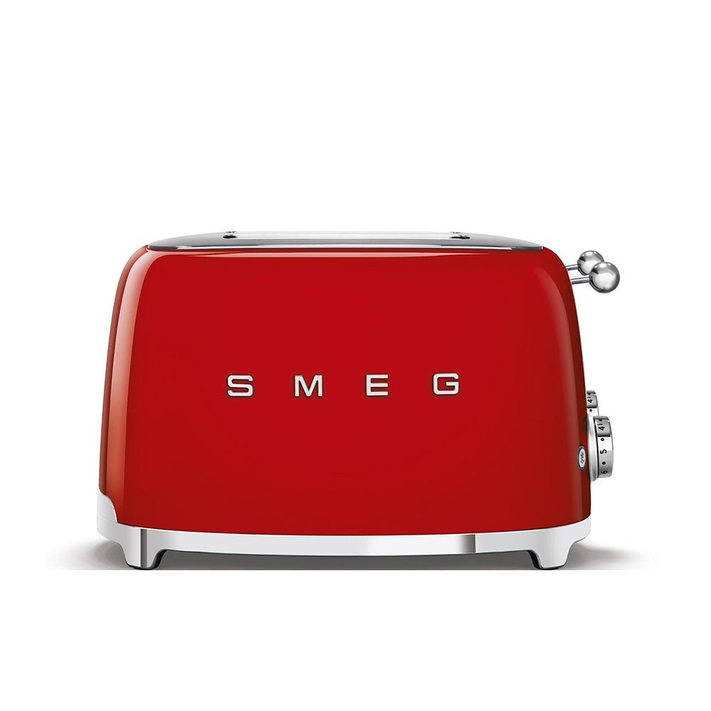Front view of SMEG 4x4 toaster showing red stainless steel body and chrome accents on white background