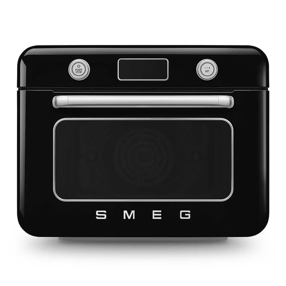 Front view of Smeg Combi countertop oven showcasing black finish, chrome handle and digital display on white background
