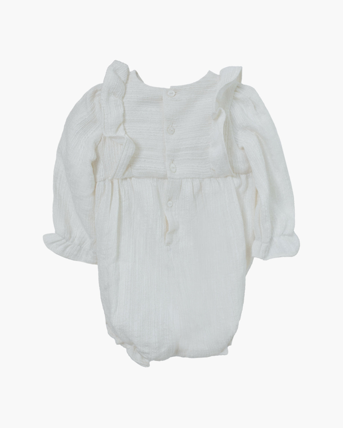 Front view of the ivory Federica Bubble showcasing ruffled sleeves and squared bib with pink embroidered flowers on a light background