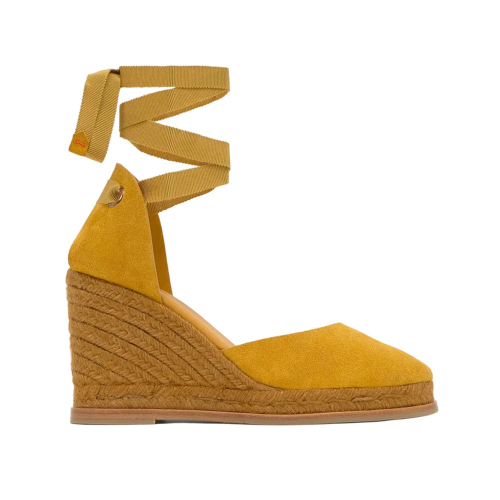 Side view of Camila 8 wedge espadrille in amber with braided jute heel, suede upper and wrap ankle ties on white background