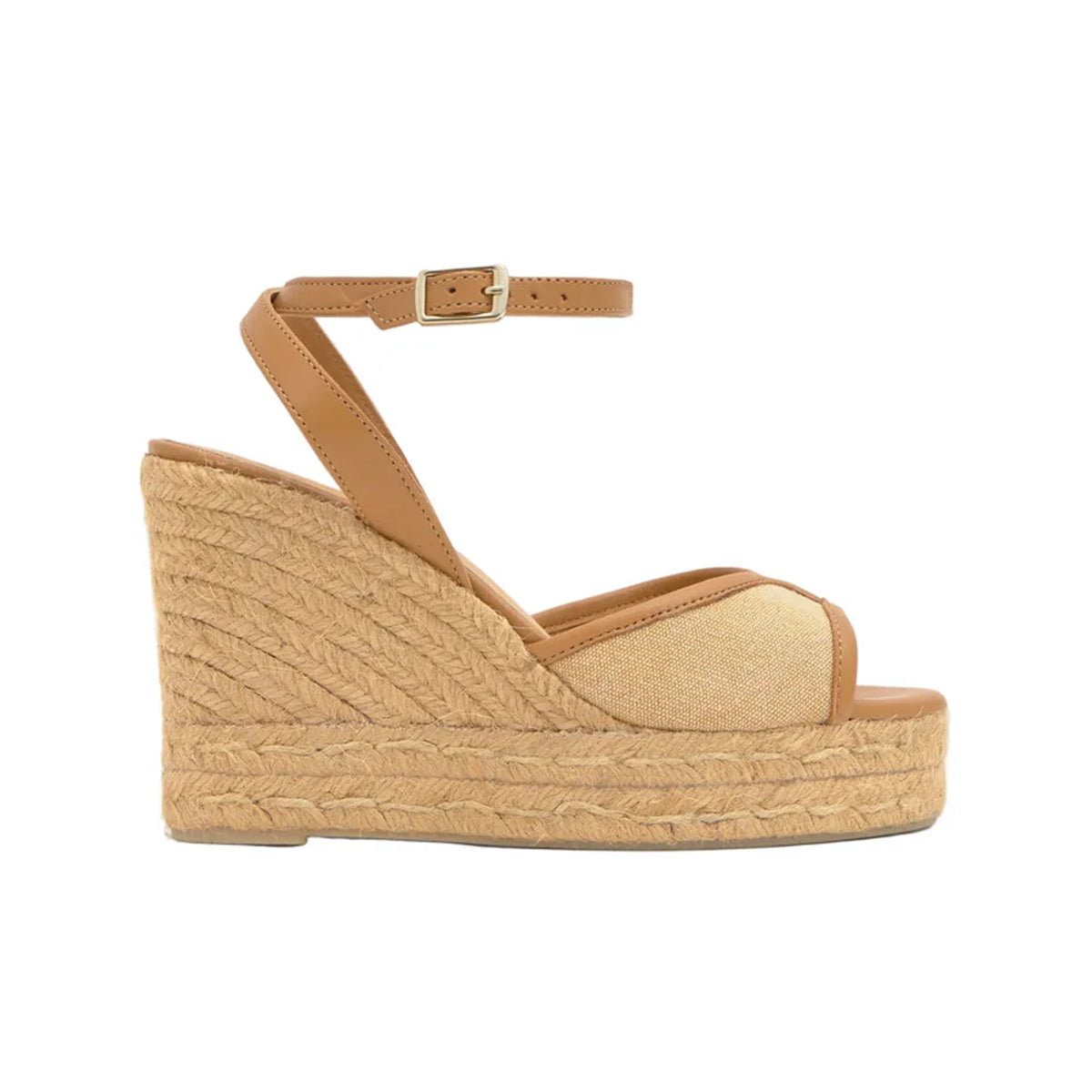Side view of Brigitte 8ED wedge sandal in ochre with ankle buckle, canvas upper and braided jute platform on white background