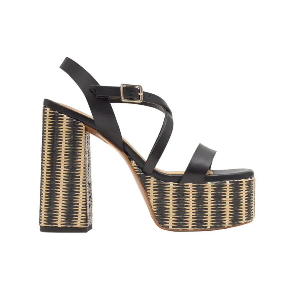 Side view of Felisa black leather platform espadrille with woven jute heel and wraparound ankle straps on white