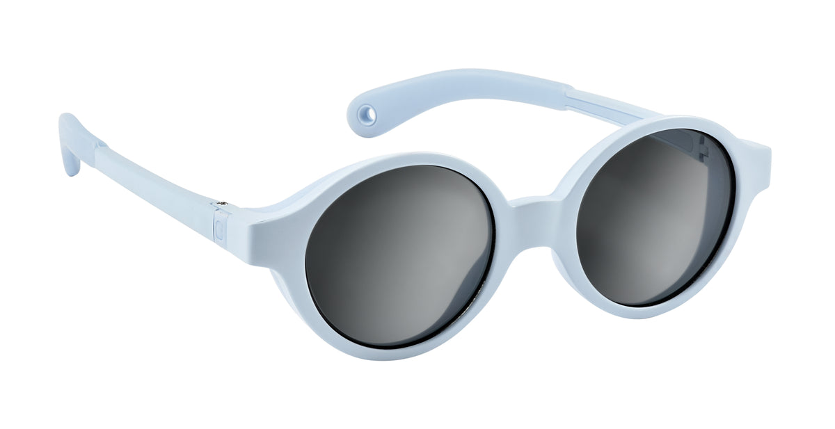 Angled view of Joy Infant Sunglasses in Pearl Blue showcasing side shells and dark lenses against a white background