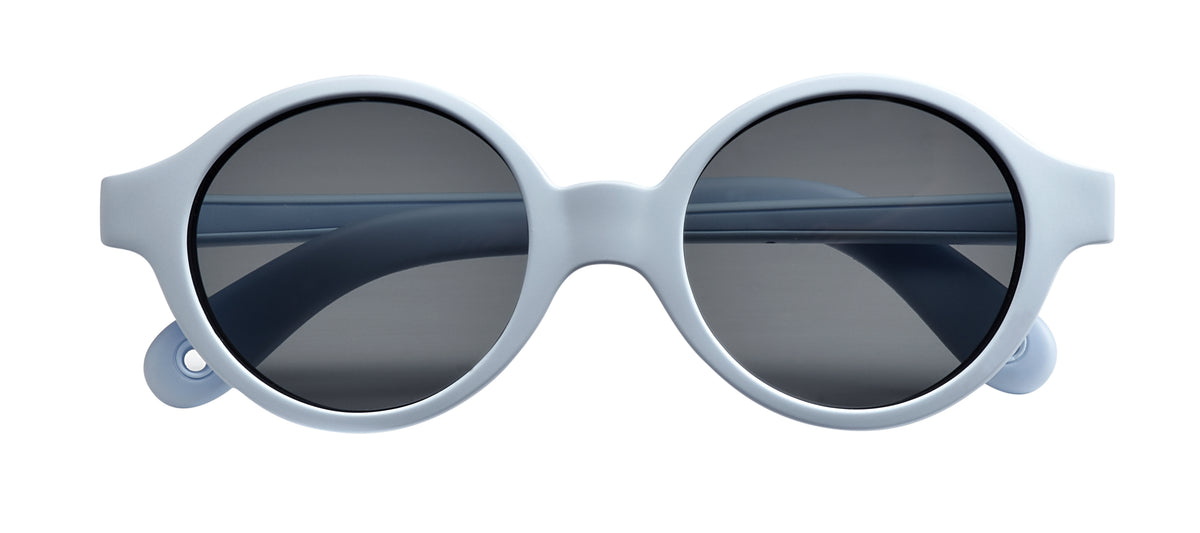 Front view of Joy Infant Sunglasses in Pearl Blue showcasing dark lenses and protective side shells with a white background