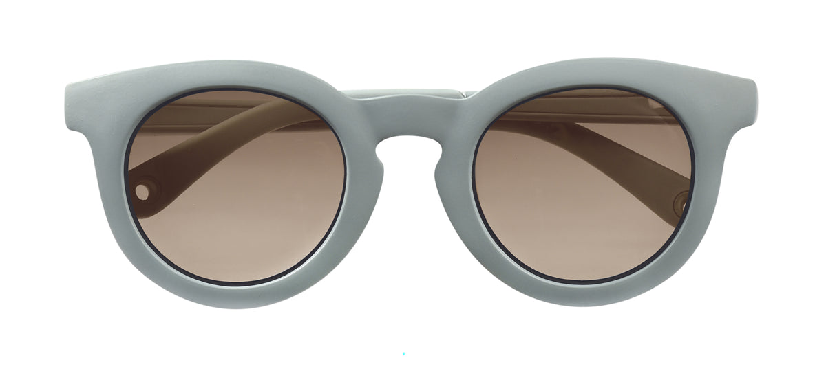 Front view of Happy Infant Sunglasses in Baltic Blue showcasing protective side shells and flexible hinges on a white background