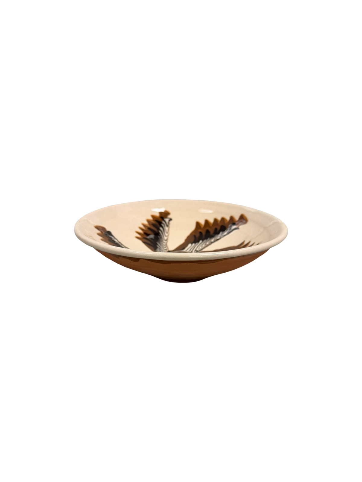 Angled view of Ariadne Pasta Bowl in cream and brown showcasing hand-painted glazed terracotta with a white background
