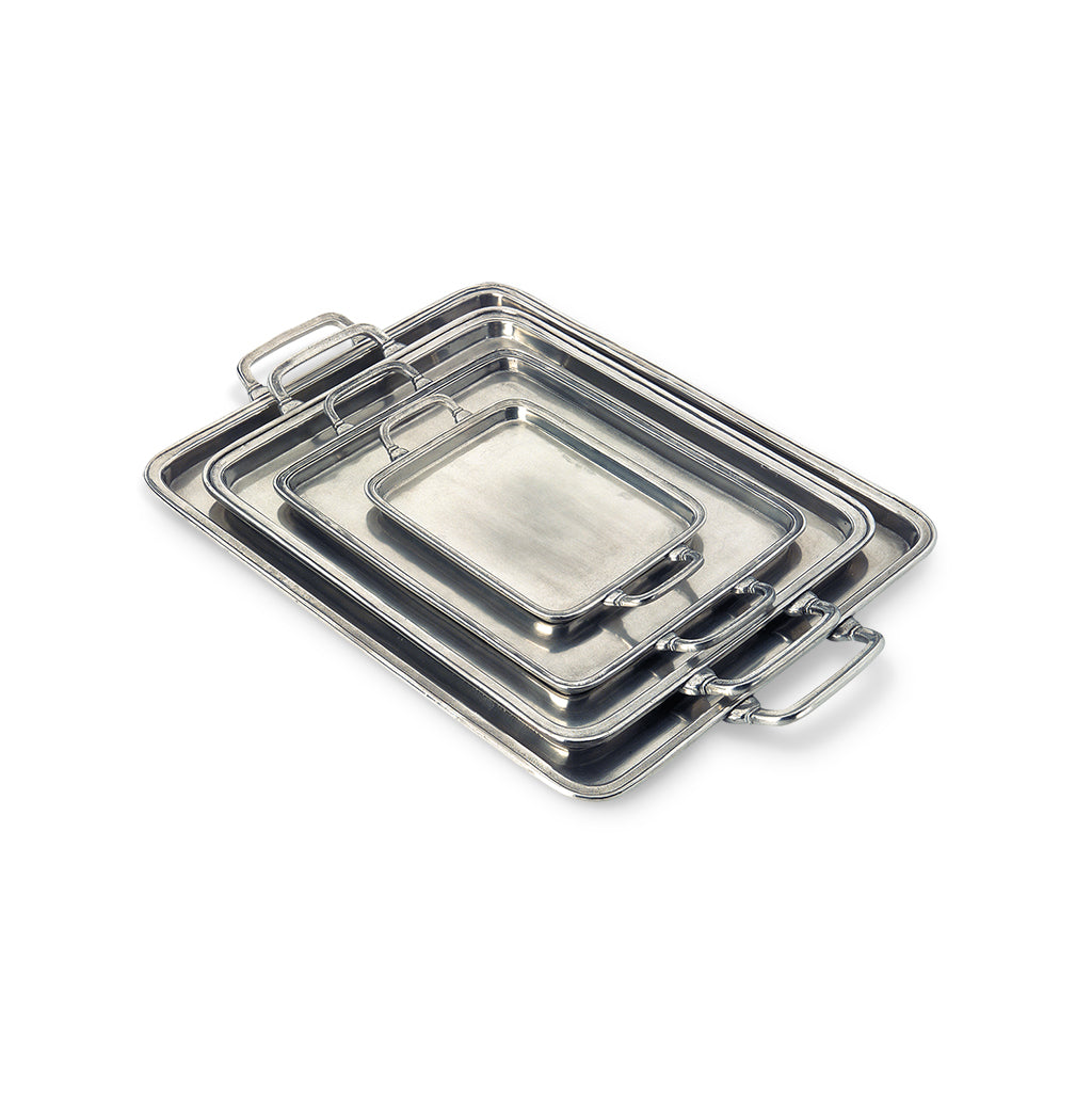 Angled view of the large rectangle pewter tray with handles showcasing its raised rim and polished finish on white
