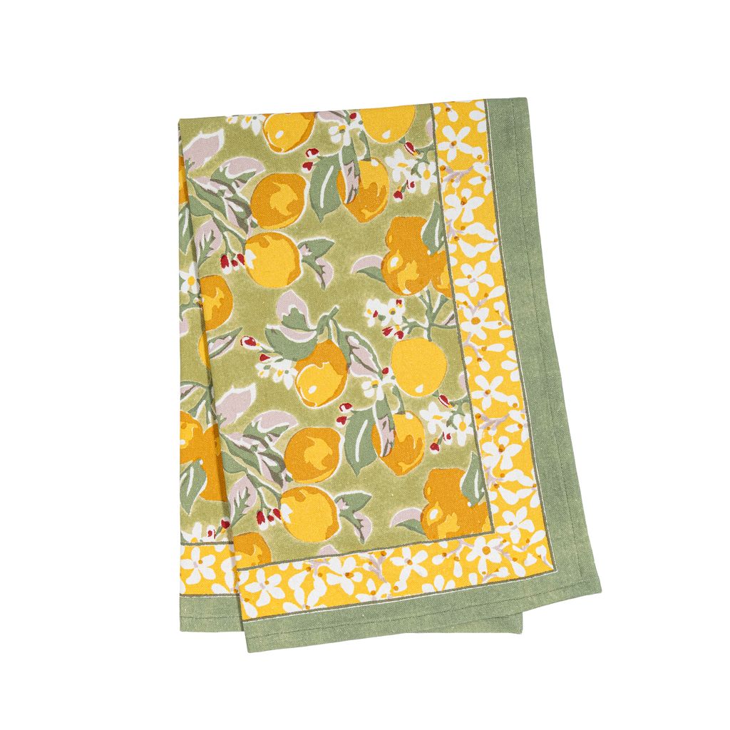 Angled view of Citron Tea Towels set of 3 showcasing green and yellow lemon and blossom print on white background