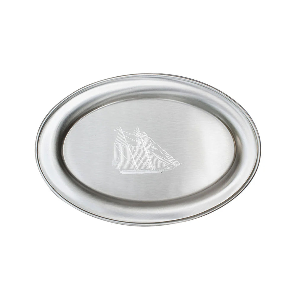 Top view of 9-inch oval pewter tray showcasing satin finish and engraved ship motif on white background