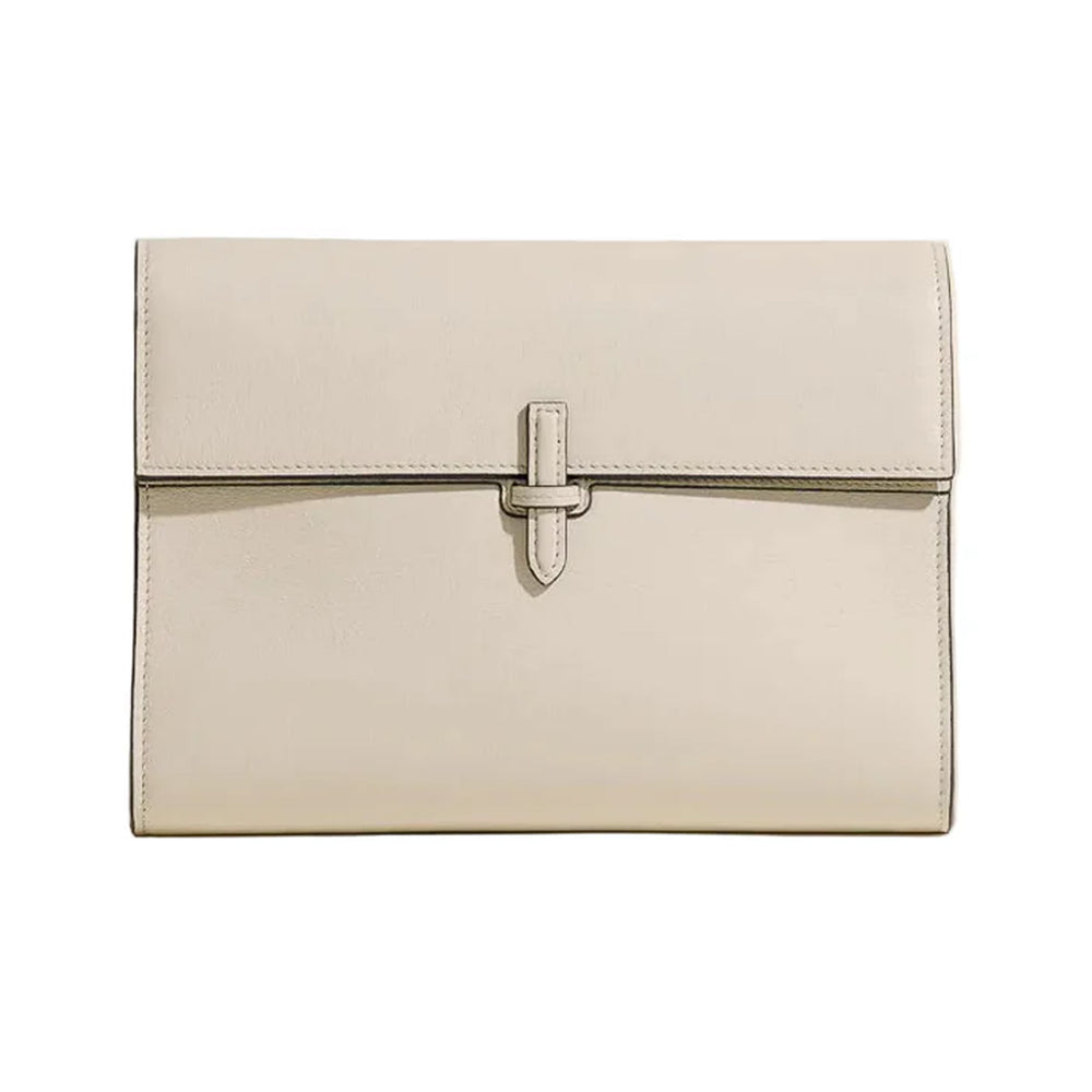 Front view of large soft clutch in Nappa Oyster leather showcasing signature closure on white background