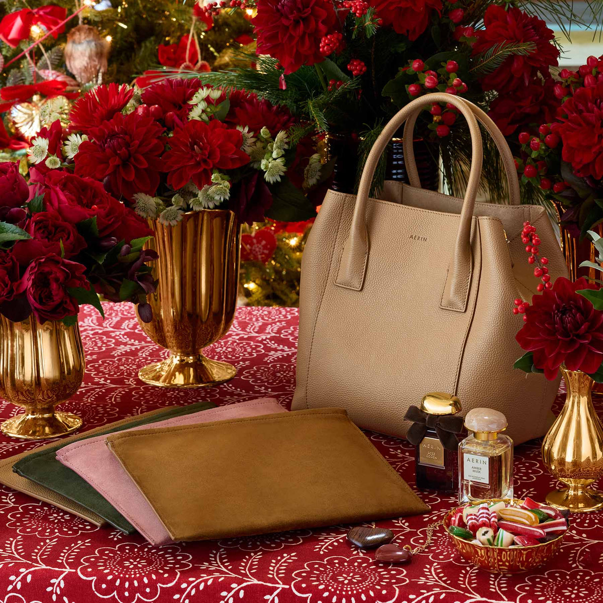 AERIN Pauline gold vases on a holiday table