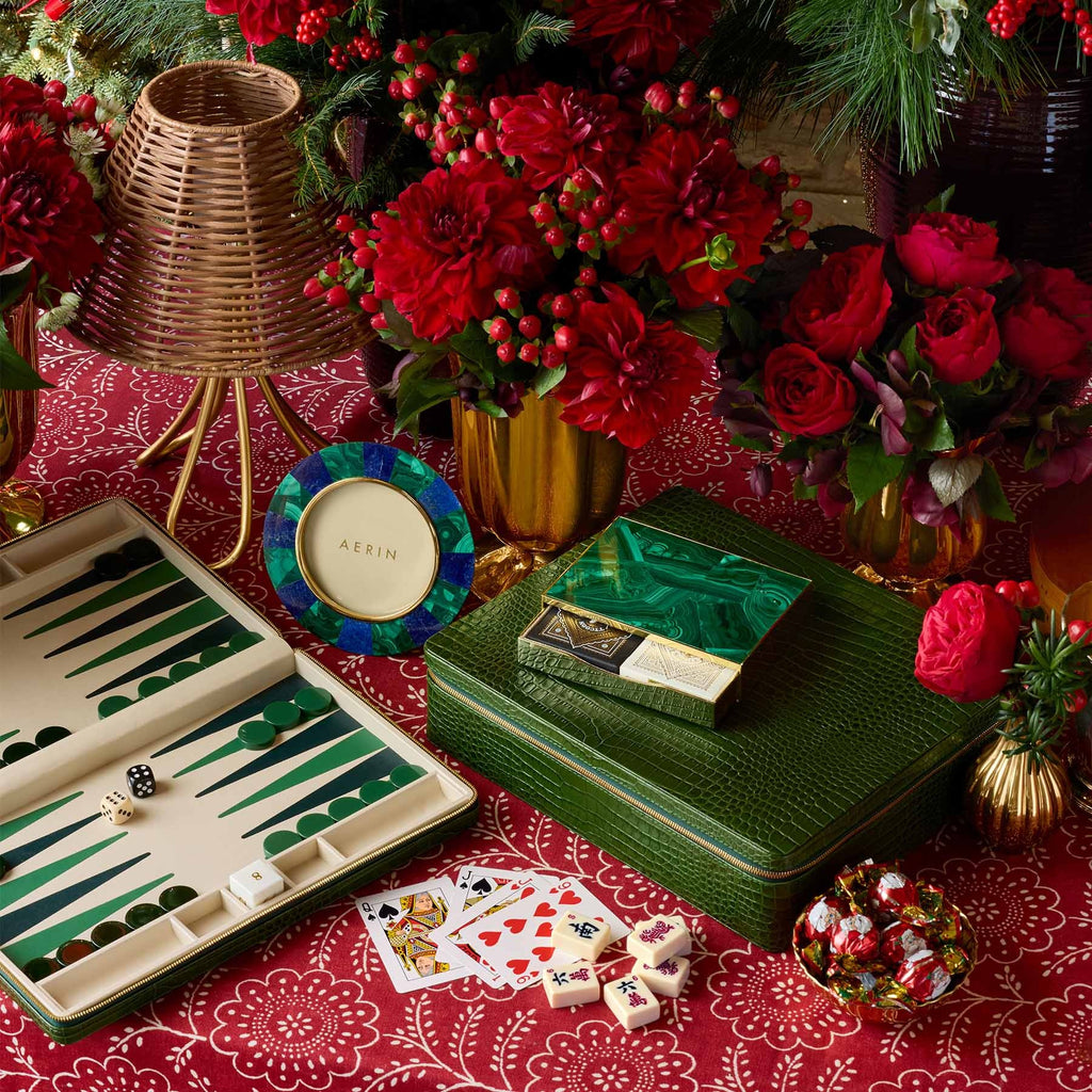 AERIN Enzo travel games in Verde and Cassiel Mosaic Card Set in Malachite on a holiday table