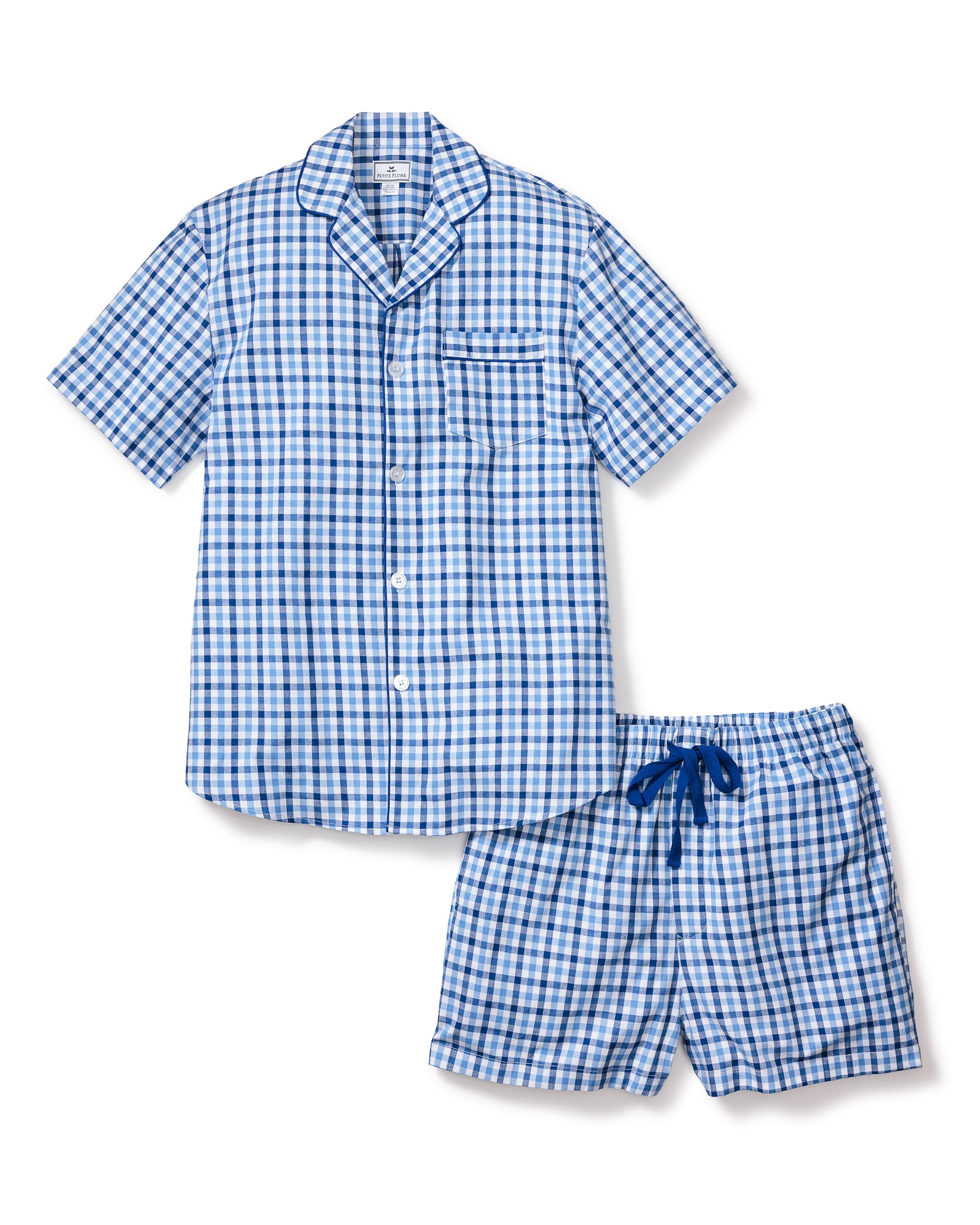 The Petite Plume Mens Twill Pajama Short Set in Royal Blue Gingham includes a button-up, short-sleeved cotton top with a chest pocket, and shorts with an adjustable drawstring waist.