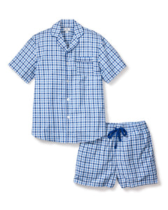 The Petite Plume Mens Twill Pajama Short Set in Royal Blue Gingham includes a button-up, short-sleeved cotton top with a chest pocket, and shorts with an adjustable drawstring waist.