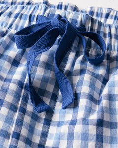 Close-up of the mens twill pajama short set in royal blue gingham by Petite Plume, showcasing a stylish checkered pattern with an elastic waistband, tied with a blue fabric bow.