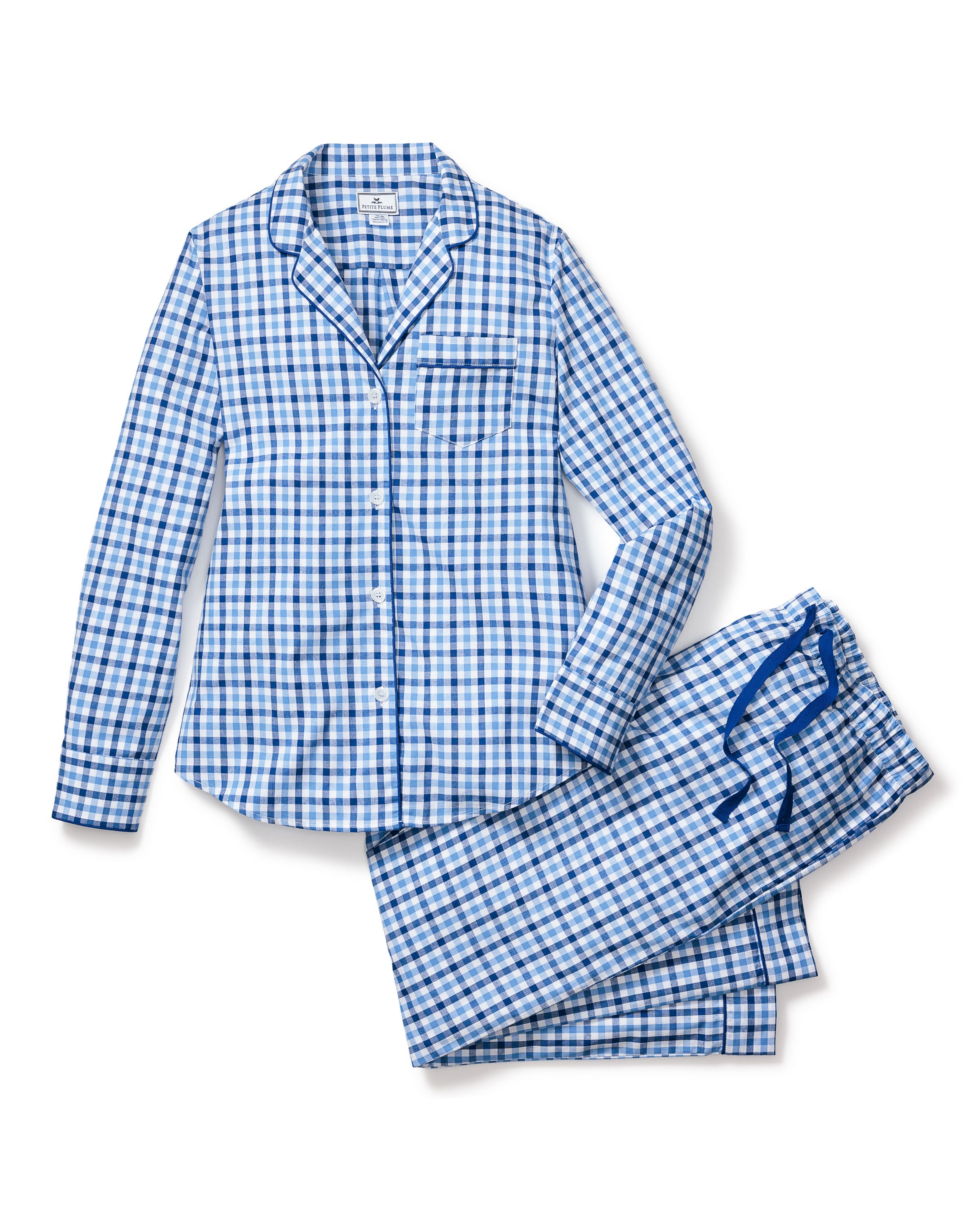 The Womens Twill Pajama Set by Petite Plume showcases a royal blue gingham design in quality cotton, featuring a long-sleeved, button-up top with collar and chest pocket, paired with drawstring waist pants for cozy nights.