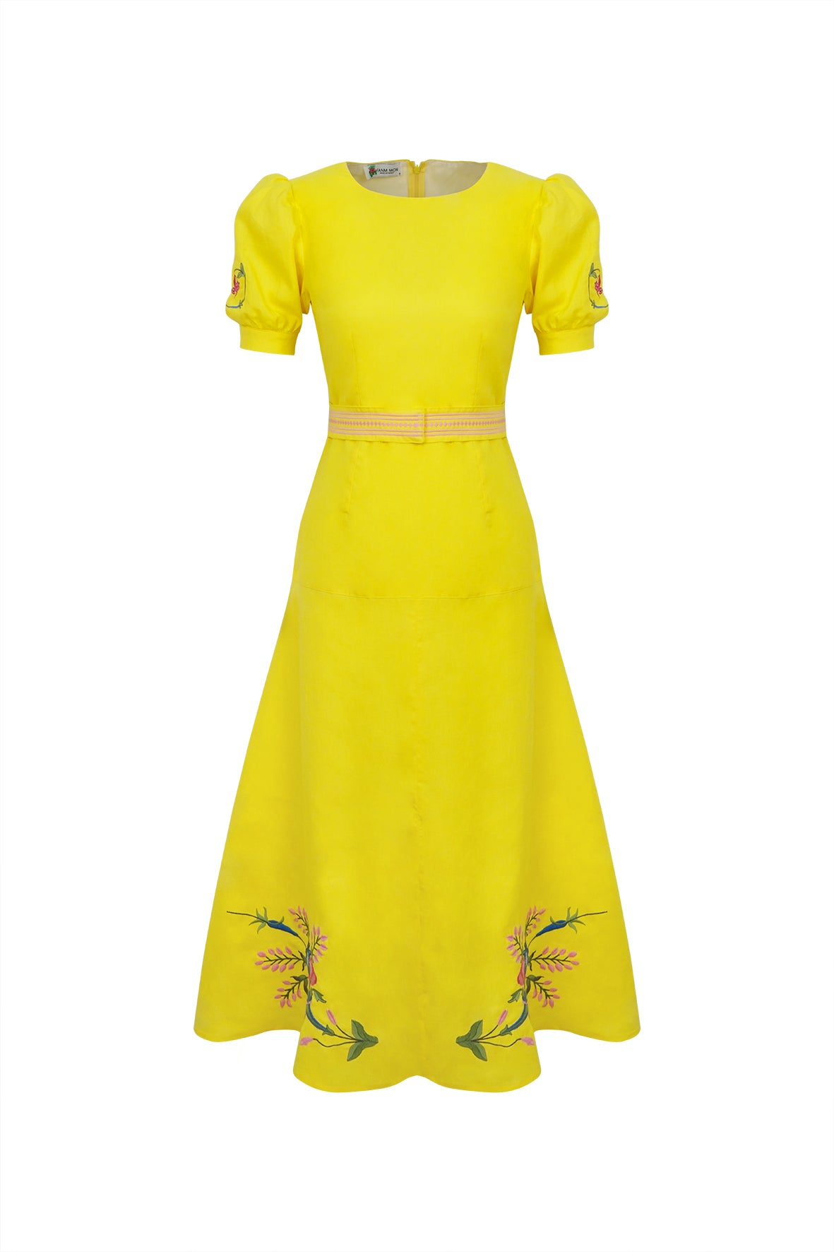 Front view of Aysin dress showcasing bright yellow color, puff sleeves, belted waist, and floral embroidery at hem on white background