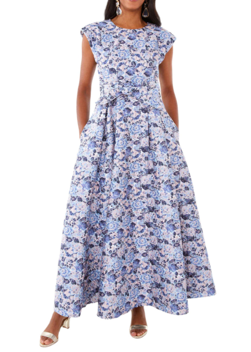 Front view of Olivia Gown in lavender bubble jacquard with cap sleeves, self-tie belt, pleated A-line skirt and pockets