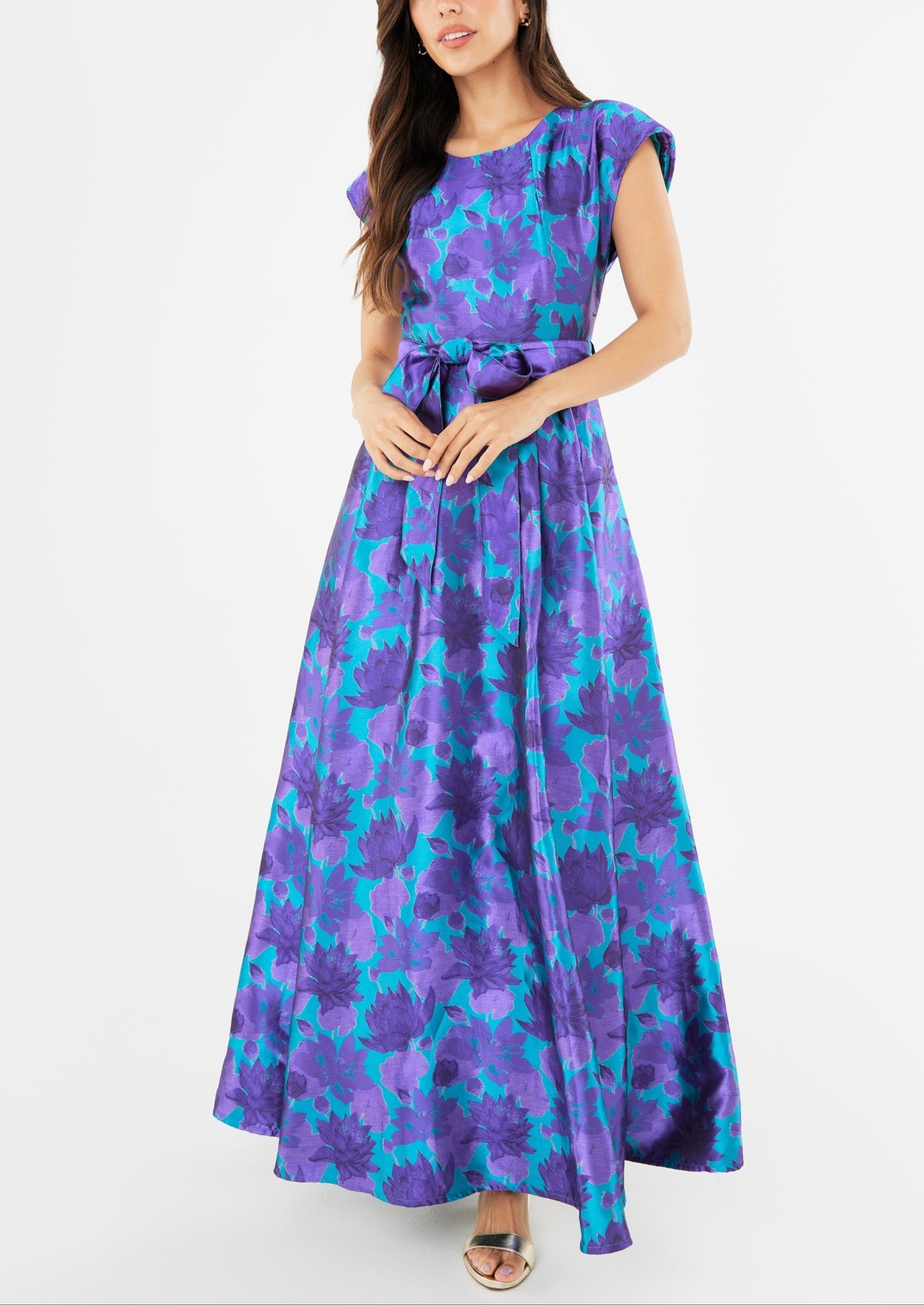 Front view of Olivia Gown in Purple Floral Silhouette Jacquard showcasing cap sleeves and self-tie belt on white background