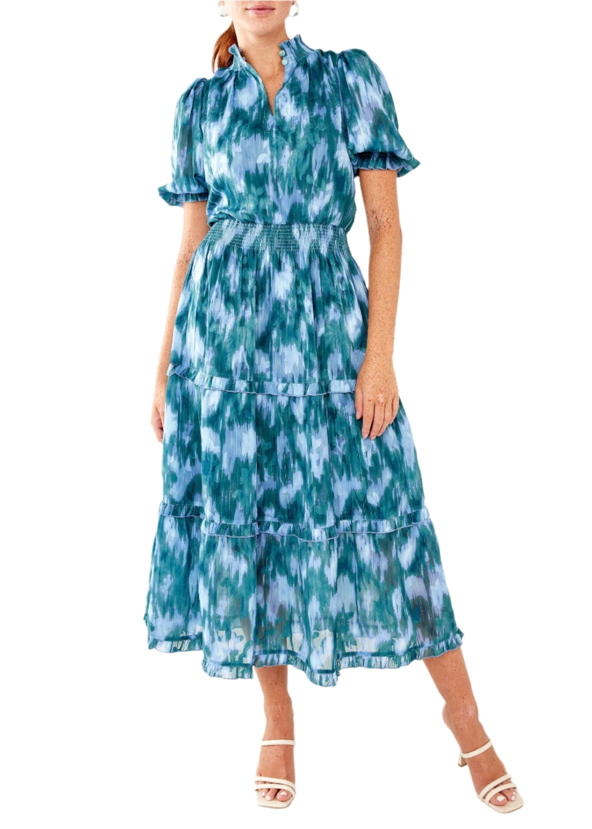 Front view of Bennett Gown in teal ikat chiffon showcasing smocked waist and tiered skirt against white background