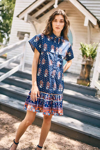 The Addison drop waist shirt dress has a crisp collar, delicate button placket in  fall floral navy.