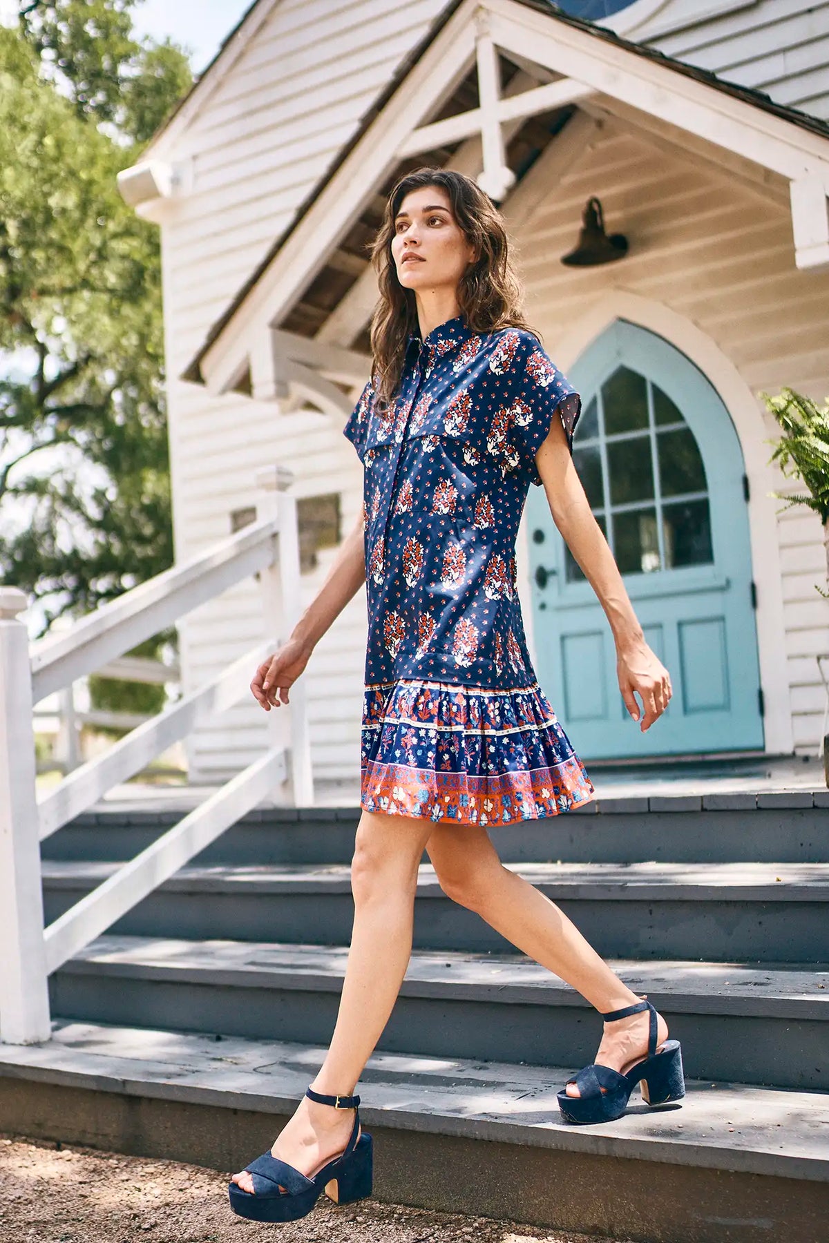 The Addison drop waist shirt dress has a crisp collar, delicate button placket in  fall floral navy.