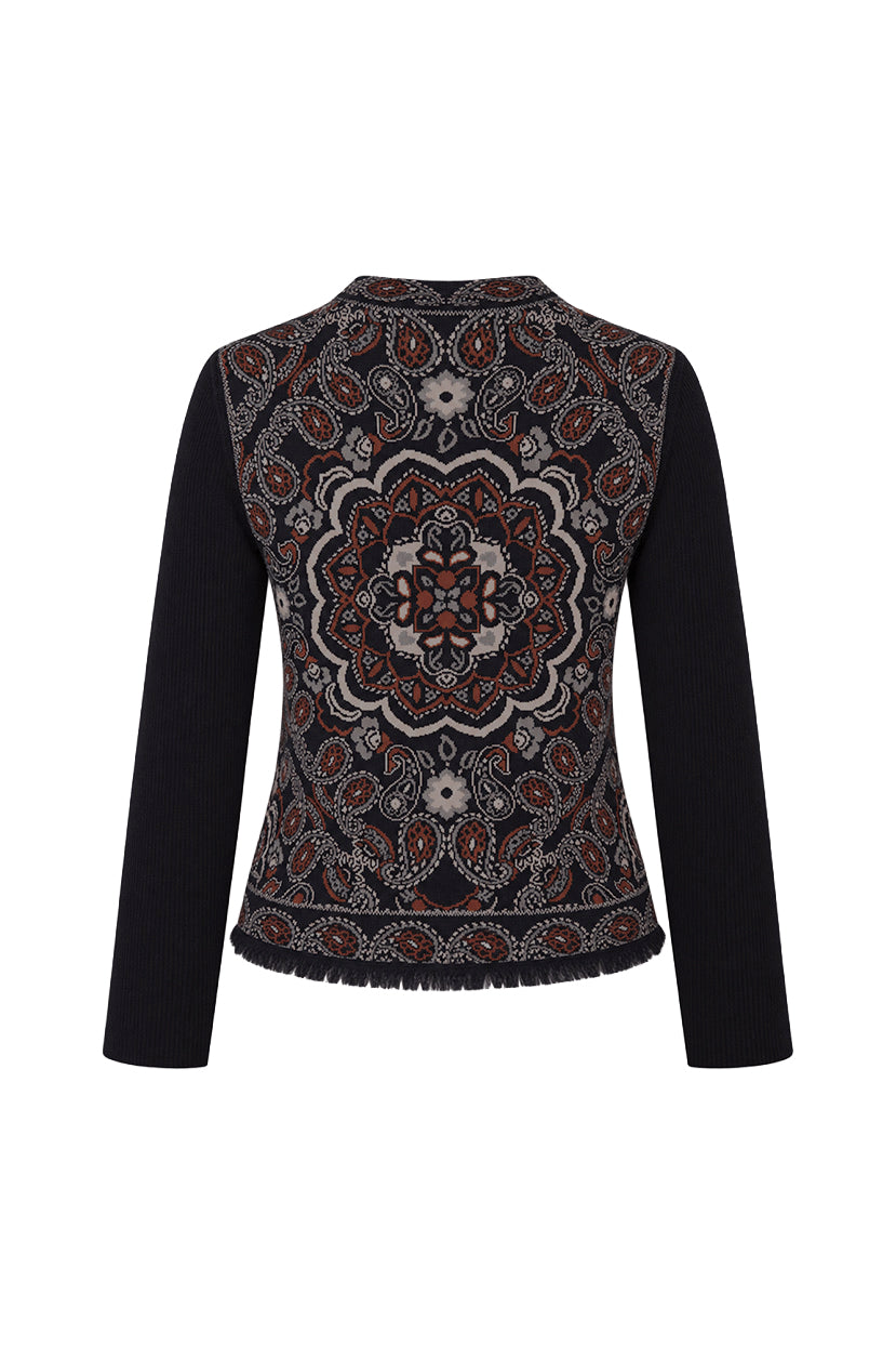 Back view of Alesia Jacket in Bandana Navy with birdseye bandana jacquard knit, ribbed sleeves, and fringe hem