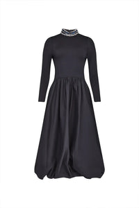 The Alexandra Dress is a fitted bodice with long sleeves, bubble skirt, and jeweled trim neckline. 