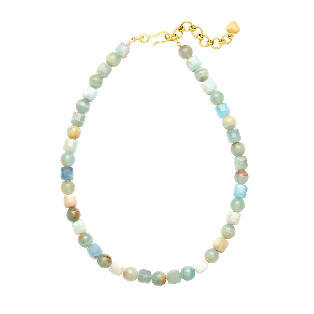 Flat lay of Amal Necklace showing round calcite and faceted cube amazonite beads with gold hook closure on white background