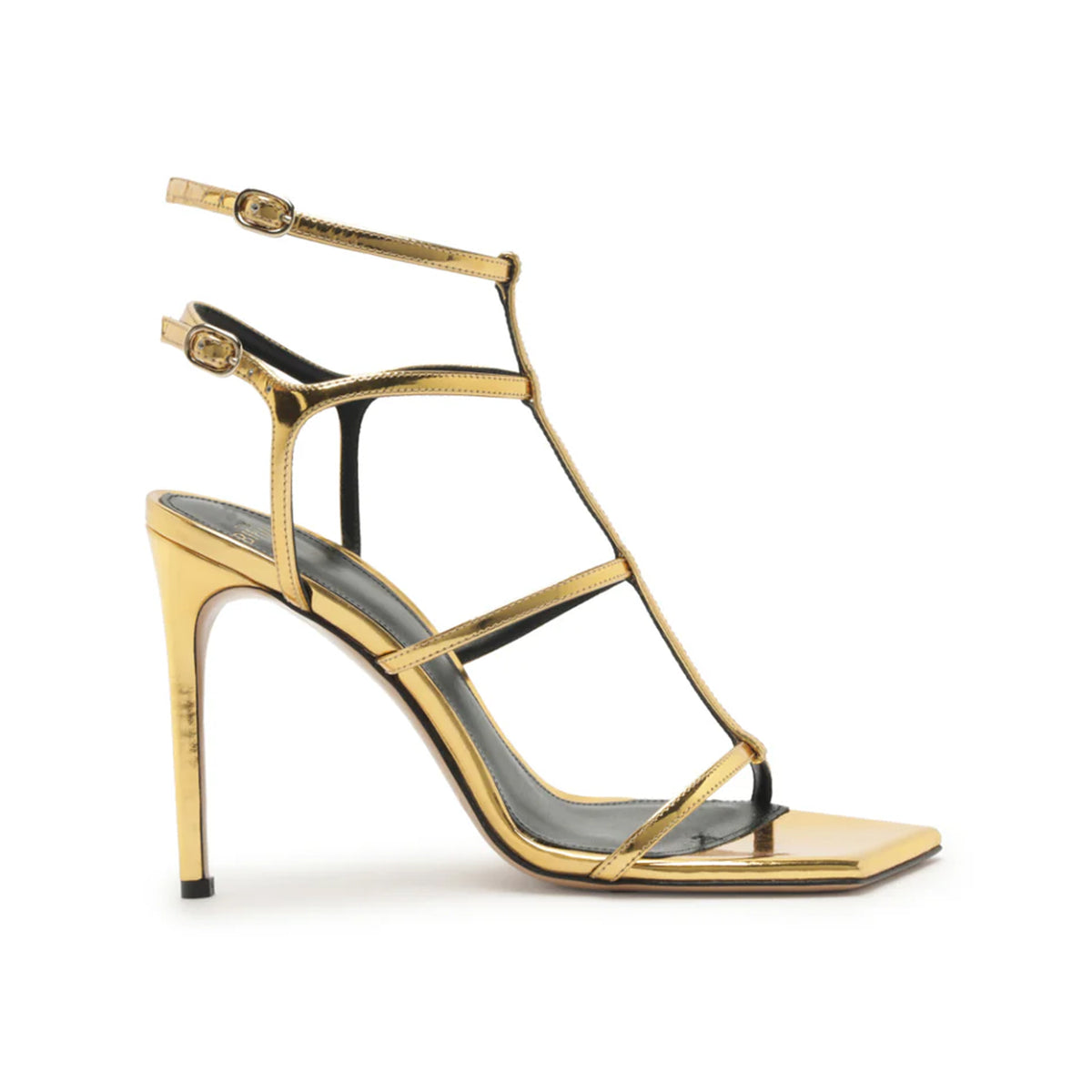 Side view of Amanda 100 in Golden sandal showcasing strappy specchio leather design and stiletto heel with white background