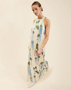 Adelina Gown in Wisteria Toile stretch crepe with halter neckline, cascading bow back detail, A-line silhouette, and hidden side pockets.