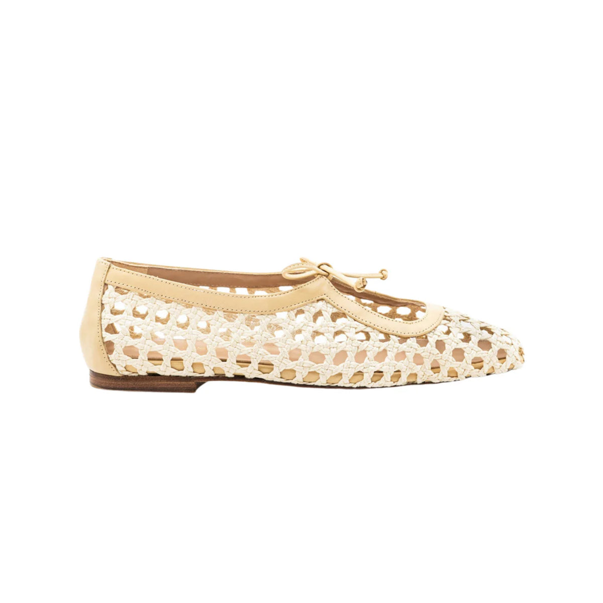 Side view of Amelia Flat in Natural Raffia showcasing woven raffia upper, vamp strap, and bow with white background