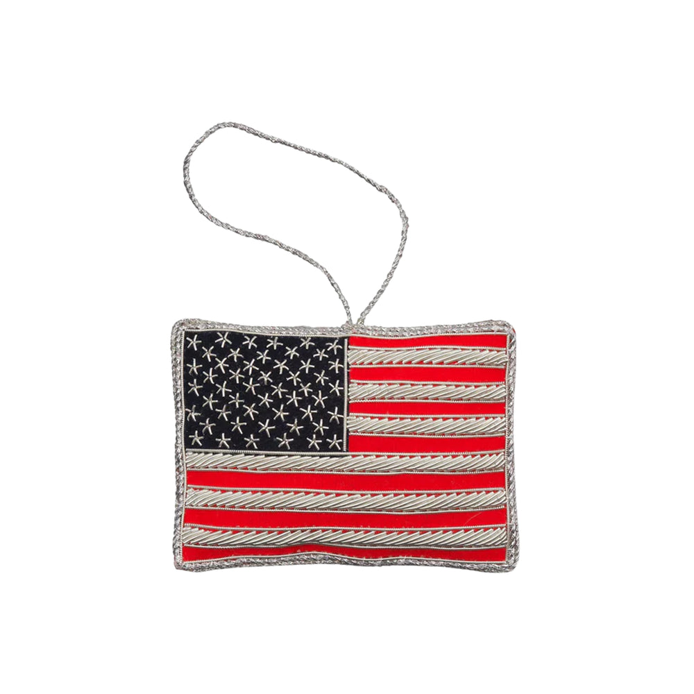 Front view of American Flag ornament with hand-stitched beads and metallic thread on velveteen, silver loop, white background