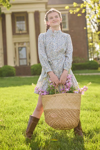 Little English traditional children's clothing. Long sleeve blue, brown, and cream floral shirt dress with tie sash for older girls.