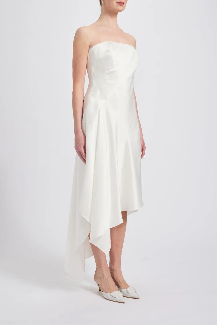 bejewelled asymmetric dress Asymmetrical dress featuring a crystal embellished bust and a cascading cape