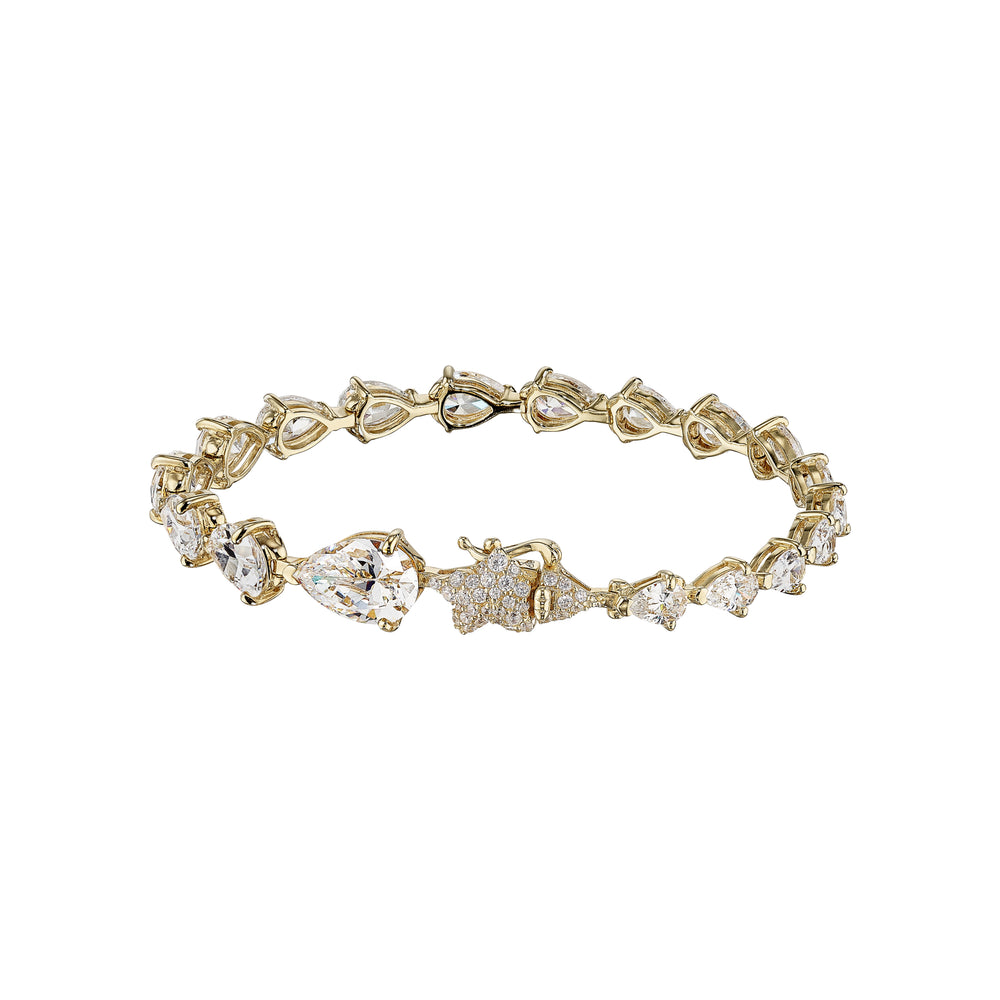 Front view of Diamond Nova bracelet showcasing pear and round diamonds with a star cluster in yellow gold on white