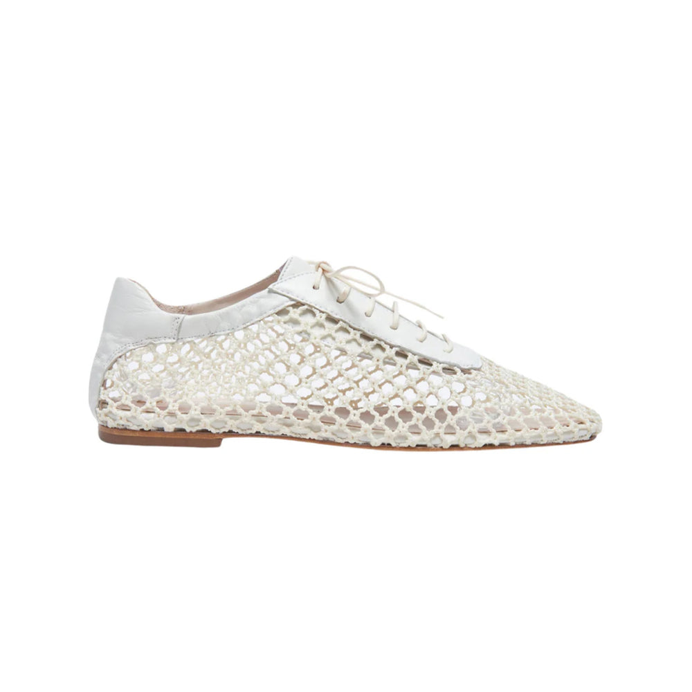 Side view of Antonia Flat showcasing open woven crochet upper, pointed toe, laces, and low leather heel on white