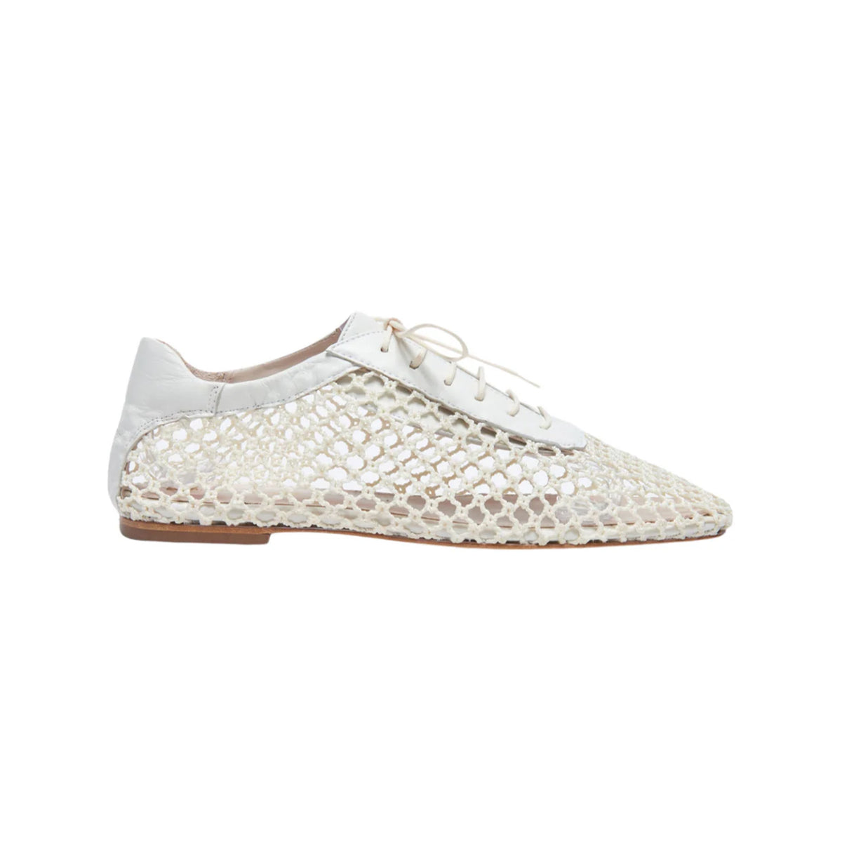Side view of Antonia Flat showcasing open woven crochet upper, pointed toe, laces, and low leather heel on white