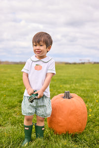 Little English classic short set for little boys.  White knit peter pan shirt with applique pumpkin at the center and coordinating banded shorts in green Leland Plaid. 