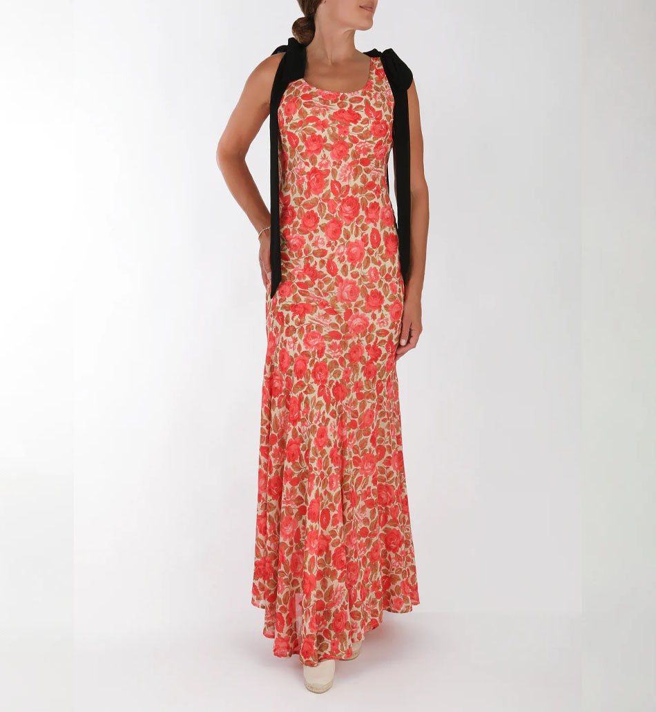 Front view of Sydney dress in Happily Ever After floral with fitted bodice, flared maxi skirt and black ribbons