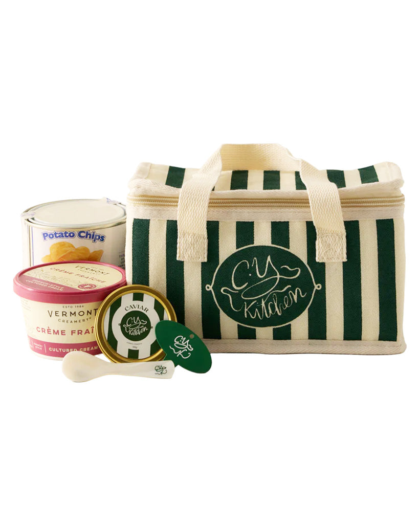 Front of Classic Caviar & Chips Set: green-striped insulated tote with caviar tin, crème fraîche tub, chips, and small spoon
