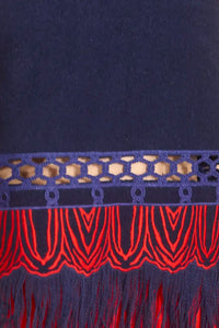 The Rivington Skirt is a midi in embroidered fringe wool, a clean finished waist and back zipper