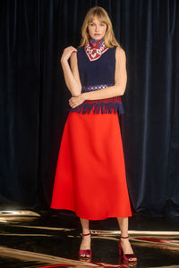 Double-sided printed scarf showcasing a whimsical winter tableau with a charming fawn at the center.