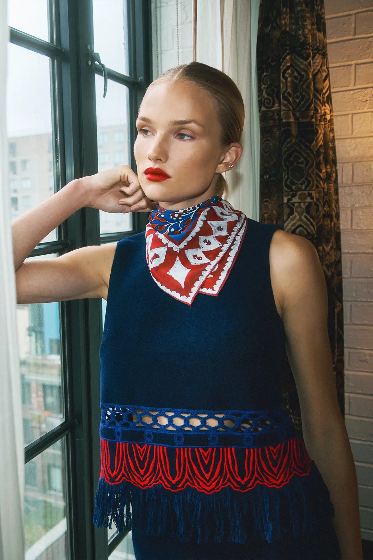 Double-sided printed scarf showcasing a whimsical winter tableau with a charming fawn at the center.