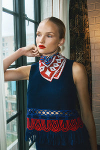 Double-sided printed scarf showcasing a whimsical winter tableau with a charming fawn at the center.