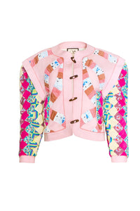 A cropped long-sleeve quilted jacket with a wooden toggle closure in multiple pastels.