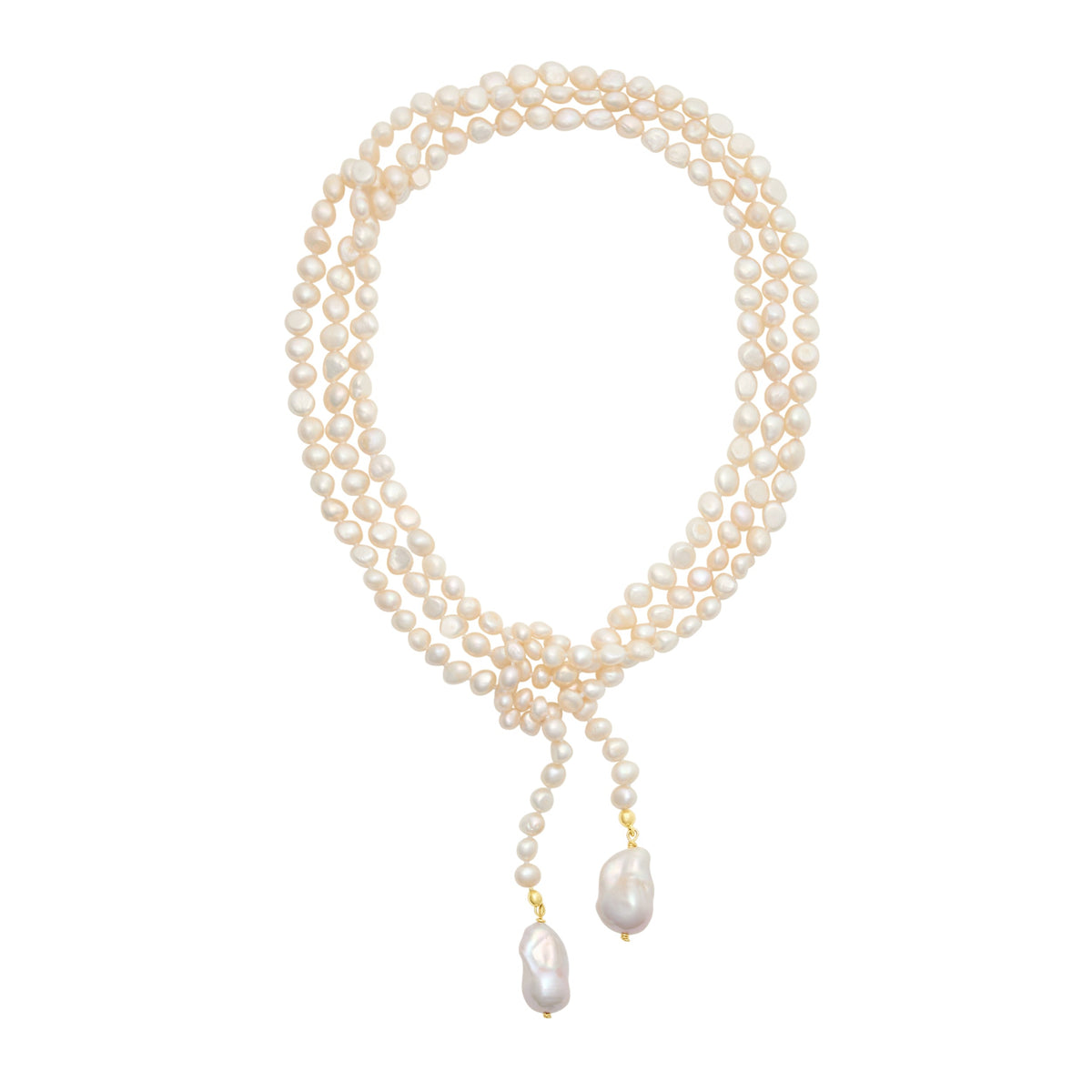 Flat lay Atticus necklace knotted freshwater pearl lariat with baroque pearl ends and gold accents on white background