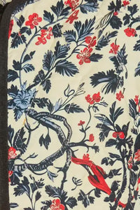 The Atwood Jacket is a quilted jacket with a crew neckline, long sleeves, and velvet ribbon trim.