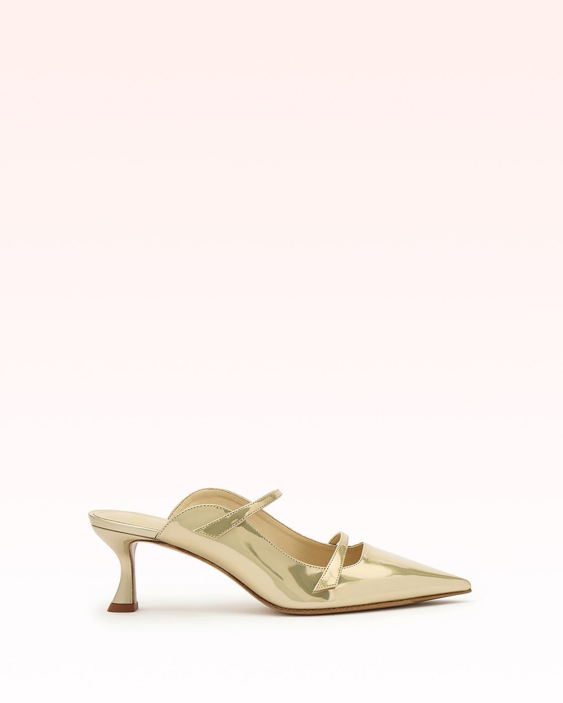 Side view of Tita Mule 60 in Yellow showcasing its pointed toe and sculptural heel against a white background