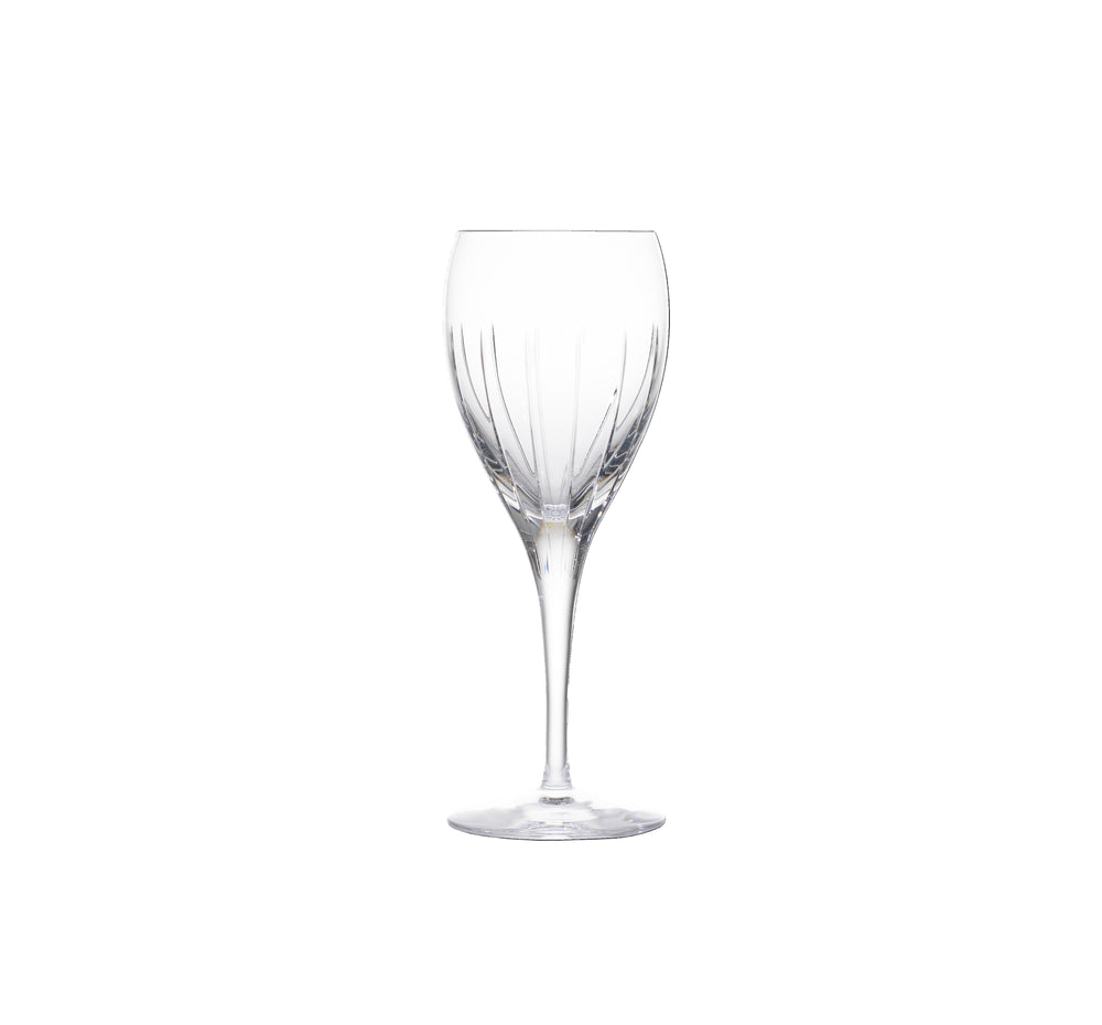Front view of Iriana crystal wine glass showing vertical cut pattern and long stem on white background